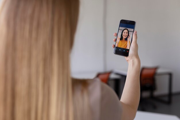 Close up woman in videocall