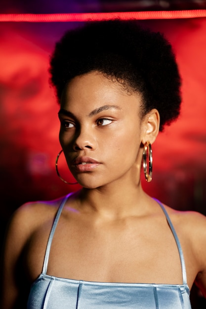 Free photo close up woman wearing earrings