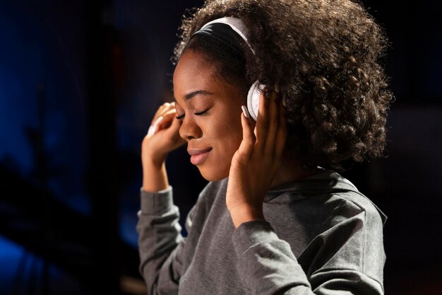 Close up woman wearing headphones