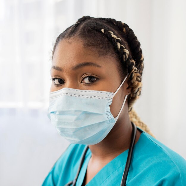 Close-up woman wearing medical mask