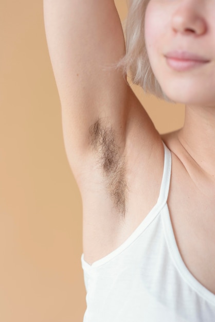 Close up woman with armpit hair