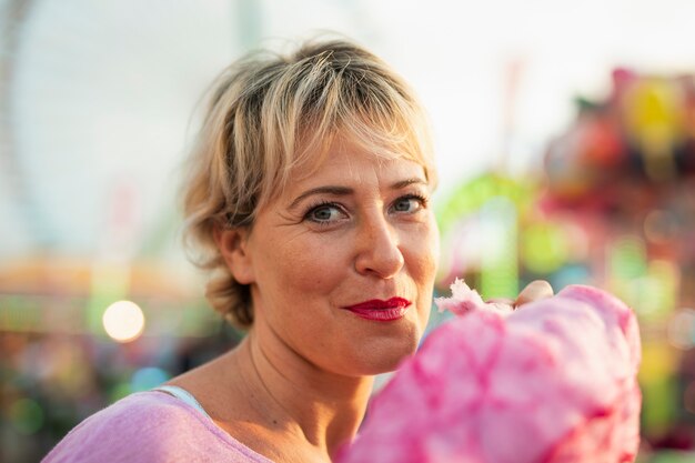 Close-up woman with cotton candy