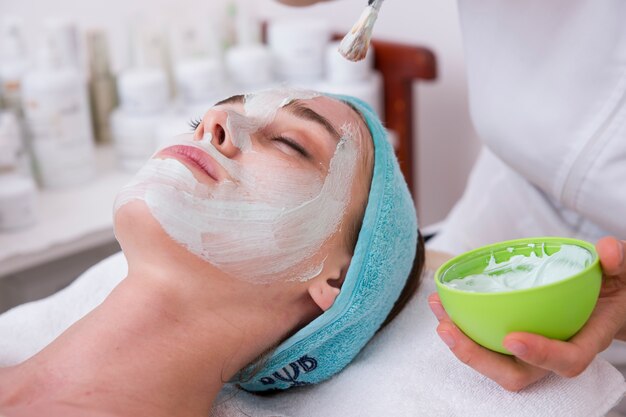 Close-up of woman with facial mask