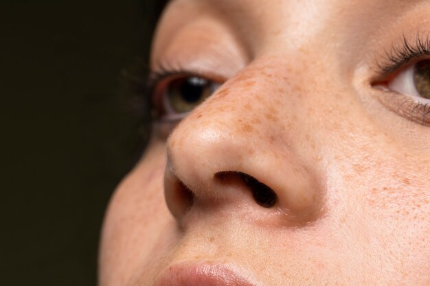 Close up woman with freckles
