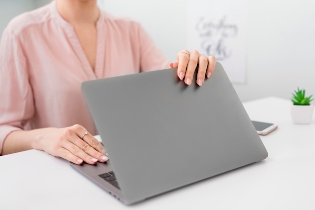 Close-up woman with laptop