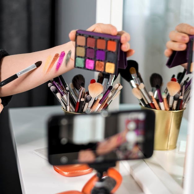 Close-up woman with make-up palette