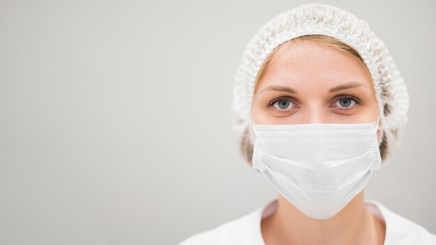 Close-up woman with mask