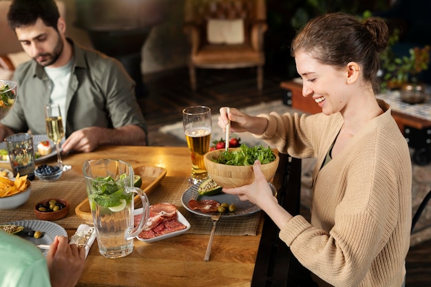 Close up woman with salad bowl