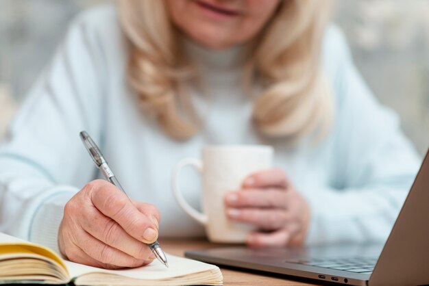 Close-up woman working from home