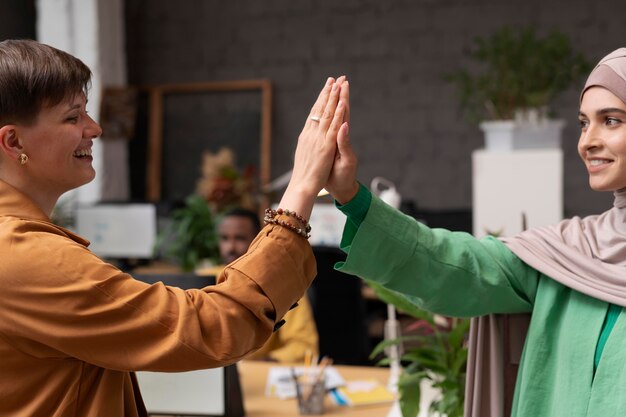 close up women high five