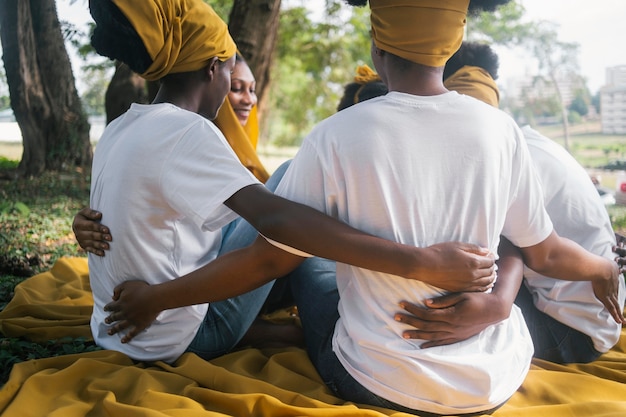 Close up women holding each other