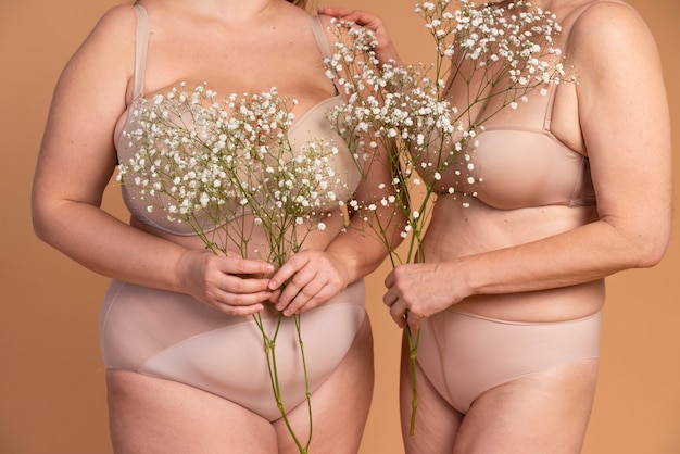 Close up women holding flowers