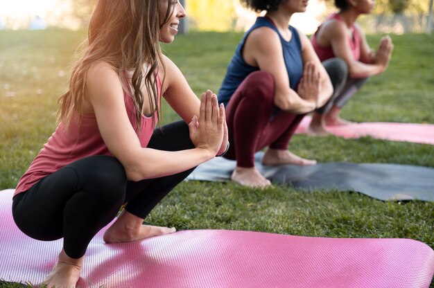 Close up women training together