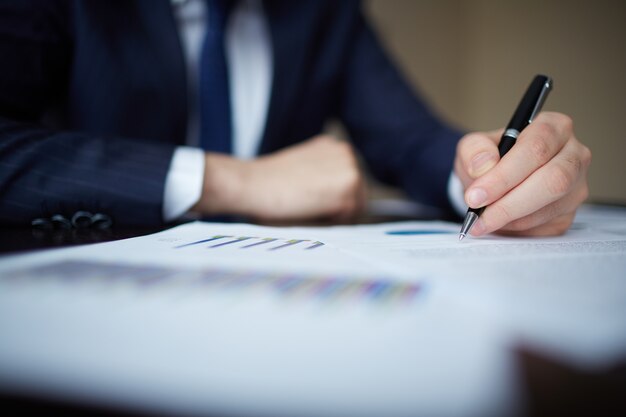 Close-up of worker taking a decision