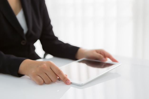 Close-up of worker with tablet