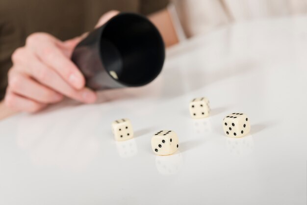 Close-up yahtzee game on white table