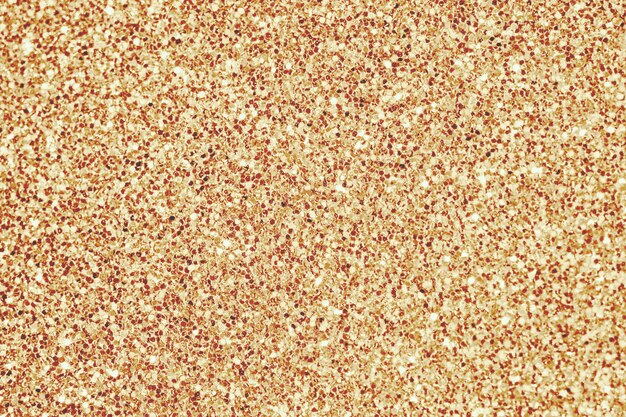 Close up of yellow glitter textured background