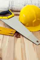 Free photo close up of yellow tools on wooden desk