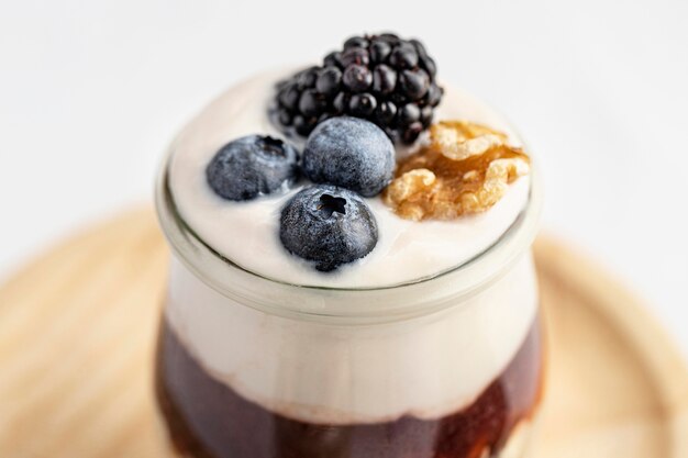 Close-up yogurt with berries and jam