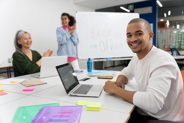 Close up on young adult working in office