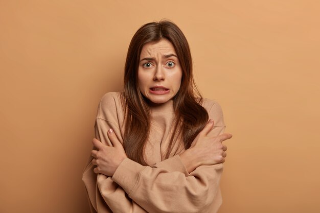 Close up on young attractive and charismatic woman isolated