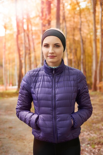 Close up on young beautiful woman jogging