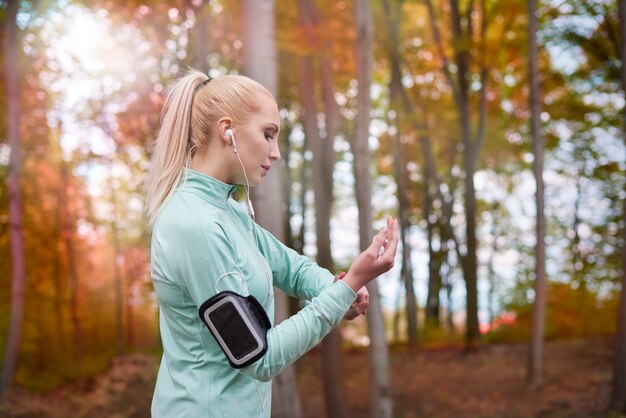 Close up on young beautiful woman jogging