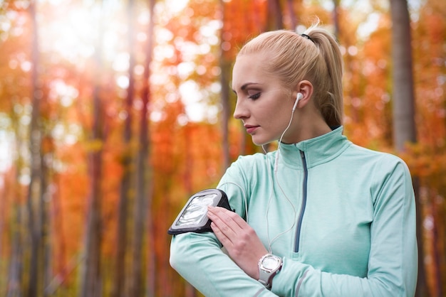 Close up on young beautiful woman jogging