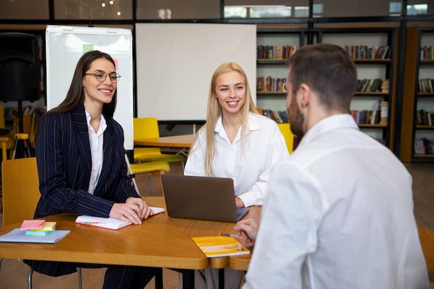 Free Photo close up on young business person doing internship