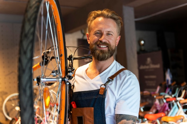 Close up on young businessman in bike shop