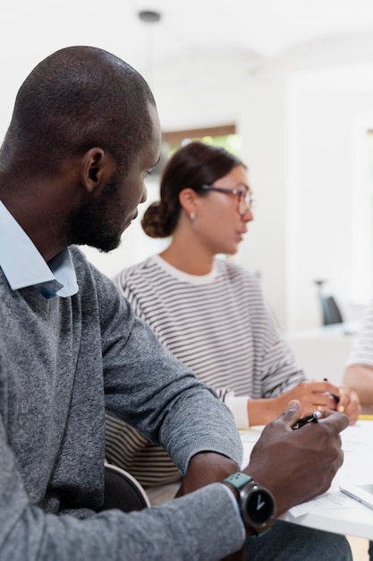 close up on young colleagues having a meeting