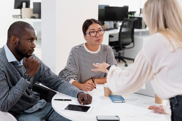 Close up on young colleagues having a meeting