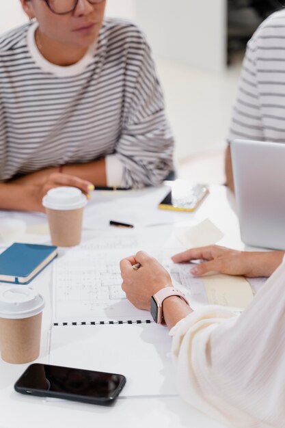 Close up on young colleagues having a meeting