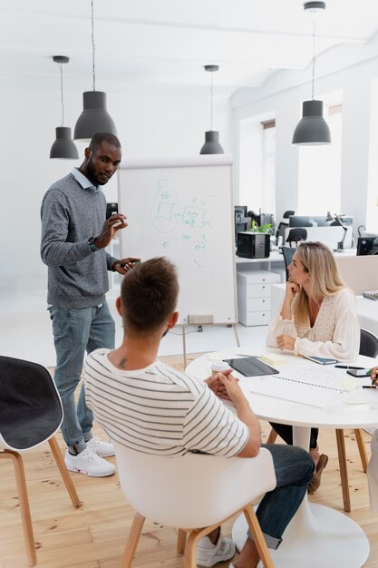 Close up on young colleagues having a meeting