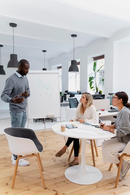 Close up on young colleagues having a meeting