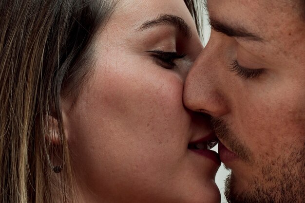 Close-up young couple kissing