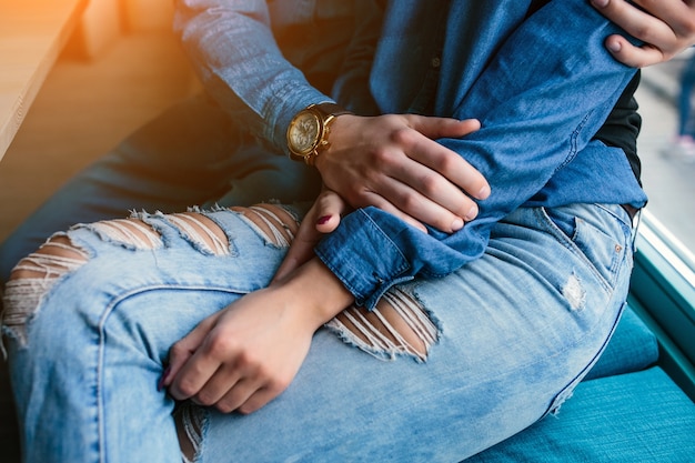 Close-up of young couple sitting