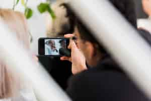 Free photo close-up of young couple taking selfie on mobile phone