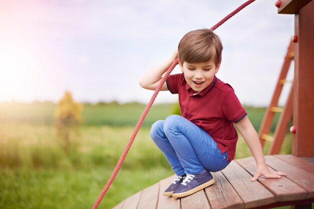 Close up on young cute boy having fun