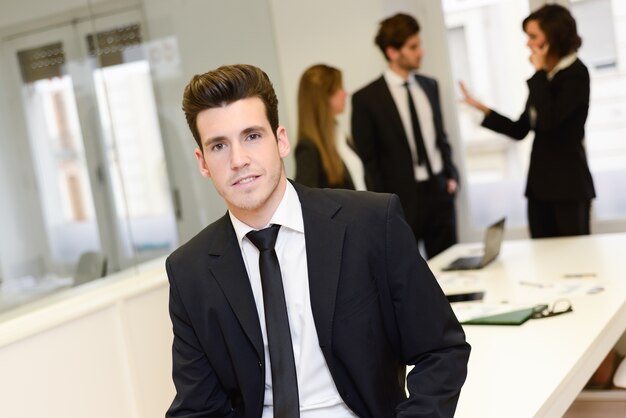 Close-up of young employee waiting for the meeting