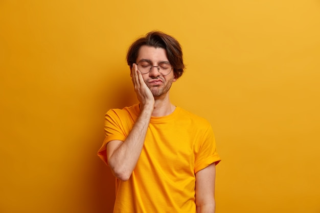 Close up on young handsome man isolated