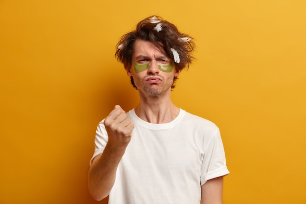 Free photo close up on young handsome man isolated