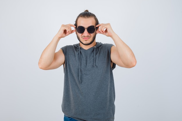 Close up on young man gesturing isolated