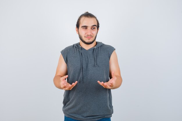 Close up on young man gesturing isolated