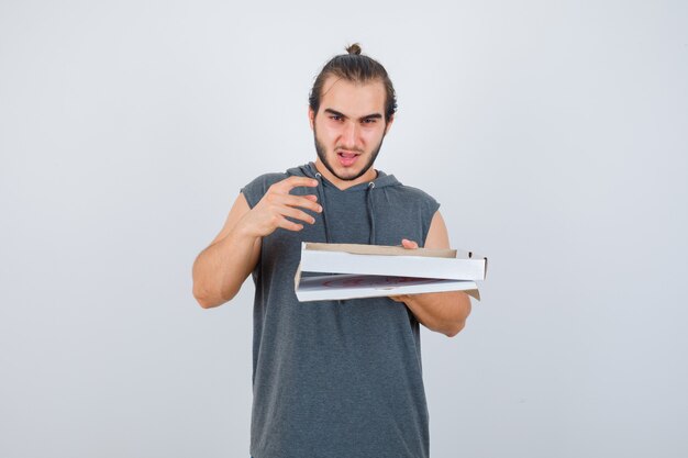 Close up on young man gesturing isolated