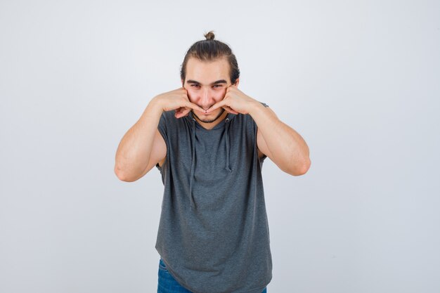 Close up on young man gesturing isolated