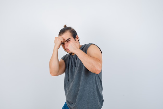 Close up on young man gesturing isolated