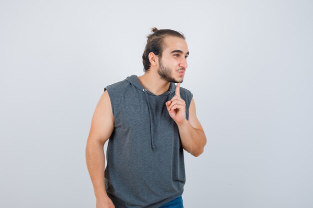 Close up on young man gesturing isolated