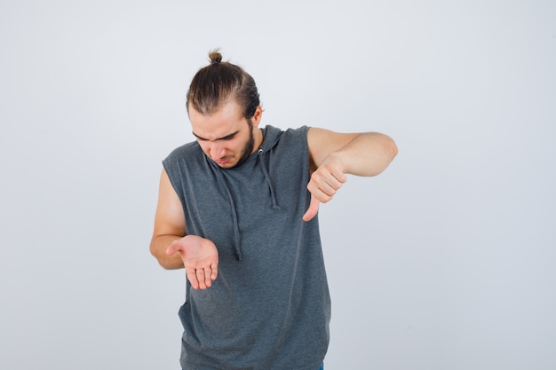 Close up on young man gesturing isolated