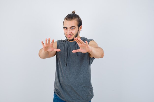 Close up on young man gesturing isolated